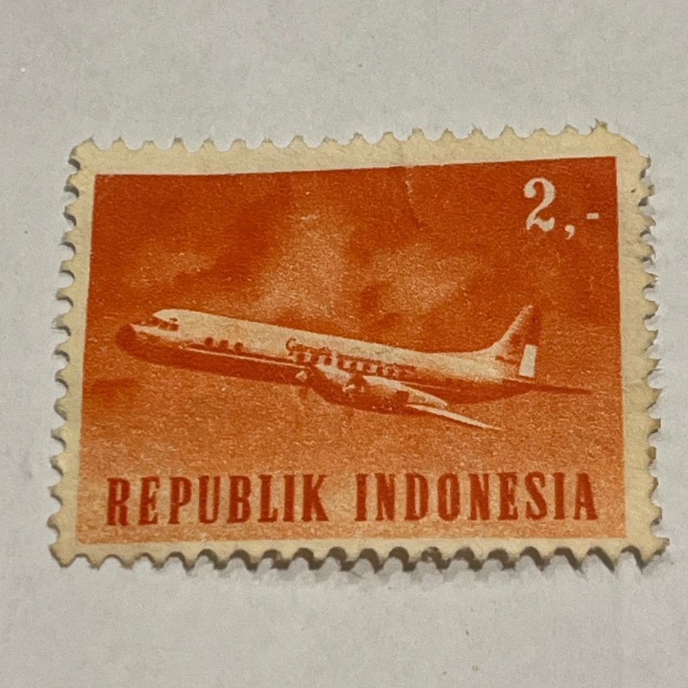 Vintage Old Postage Stamp Indonesia, 1964 Lockheed Electra Airliner Plane